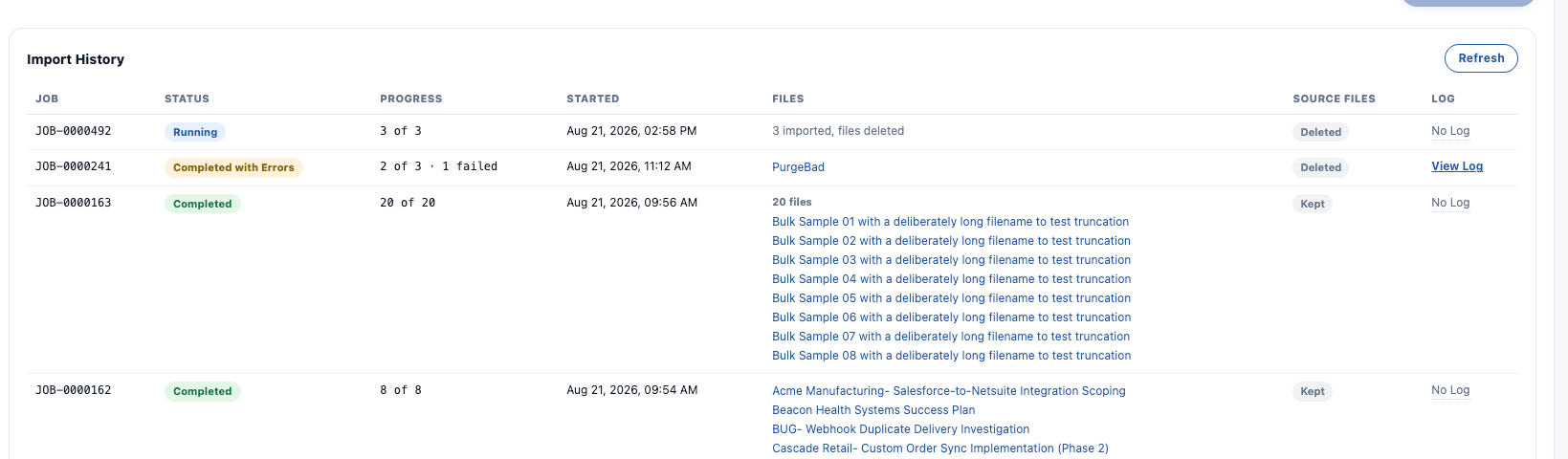 The Import History table showing Running, Completed, and Completed with Errors jobs