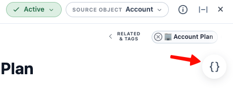 The floating braces icon that opens the Merge Field Picker