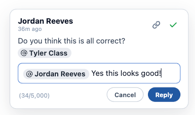 A reply being typed in a comment thread, opening with a gray User Mention chip naming the person being mentioned