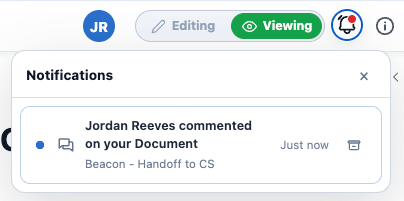 The Notifications panel open, showing a comment notification with its archive button